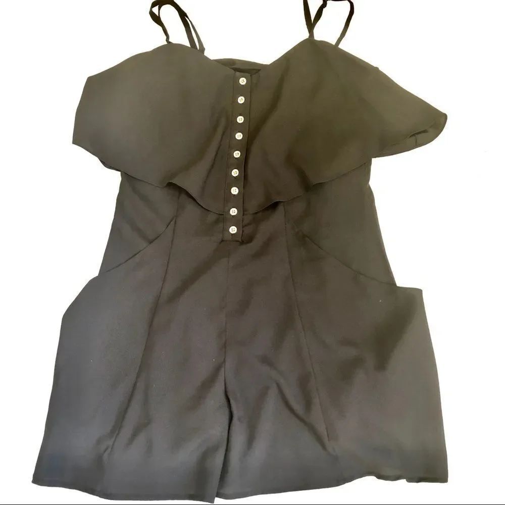 BEBE black cold shoulders ruffle detail romper S